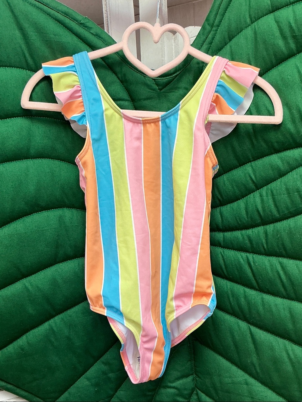 NWT Roxy kids one piece swimsuit, stripes with ruffle sleeve. Size 5